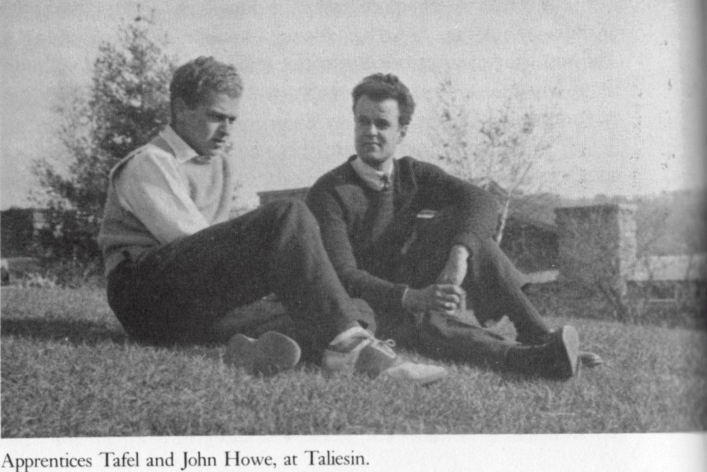 Black and white photograph of apprentices Edgar Tafel and Jack Howe sitting on Taliesin's Hill Crown.