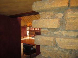 Stone wall in Wright's private office with this studio in the background.
