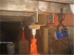 Looking at a new beam in Taliesin's crawlspace