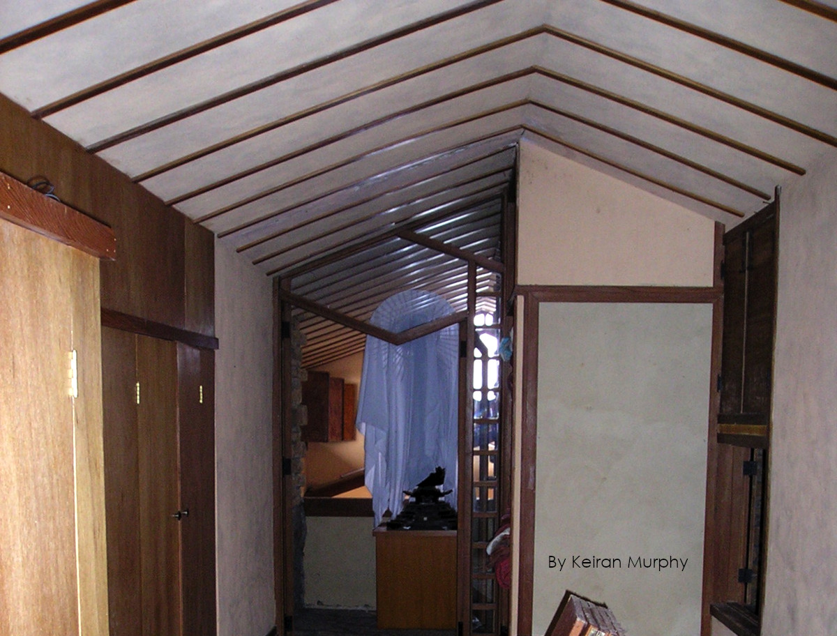 Photograph from balcony at Taliesin. Taliesin's living room is in the background, past the Buddha under the white sheet.