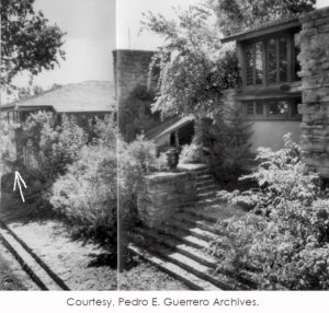 Photograph of Taliesin by Pedro E. Guerrero. Photograph showing Frank Lloyd Wright's living quarters at his home, Taliesin. A drawn arrow points to a detail on the photograph.