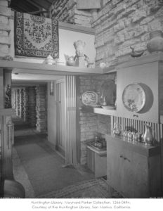Black and white photograph of the southwest corner of Taliesin's Living Room. Photograph taken by Maynard Parker in 1955.